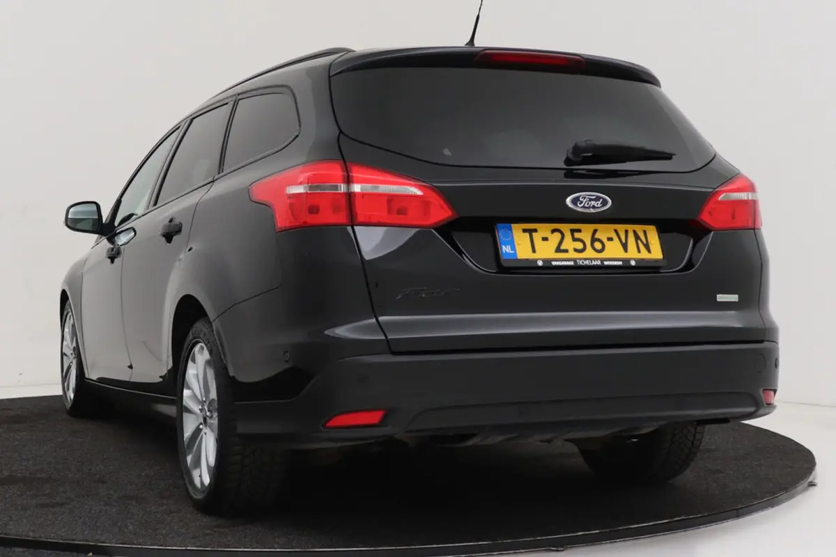 1.0 Titanium | Inruilkoopje! | Parkeersensoren | Navigatie | All-season | Stoelverwarming | Cruise Control |