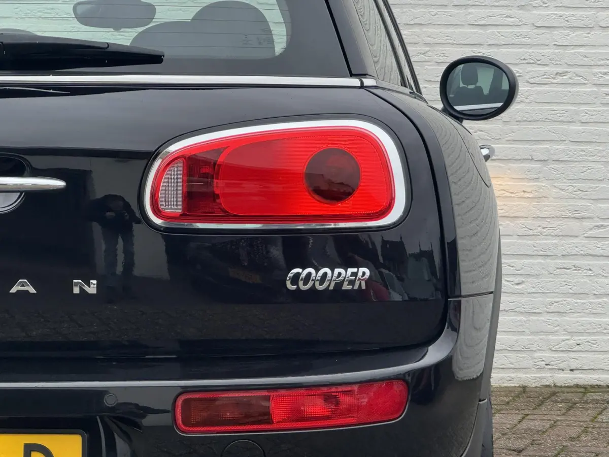 Mini 1.5 Cooper Sportstoelen half leder Navigatie Cruise Clima Trekhaak