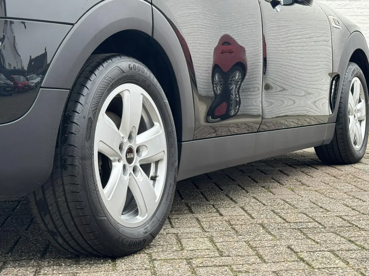 Mini 1.5 Cooper Sportstoelen half leder Navigatie Cruise Clima Trekhaak