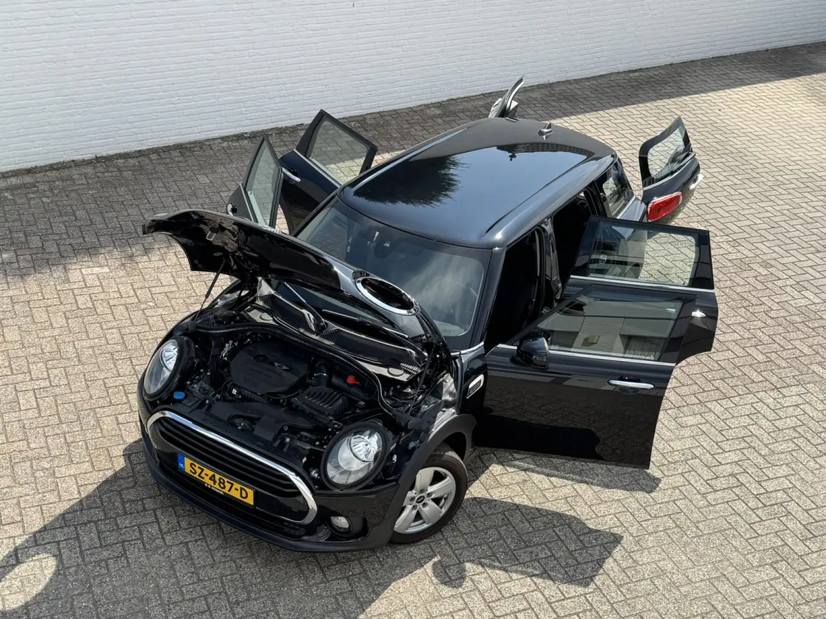 Mini 1.5 Cooper Sportstoelen half leder Navigatie Cruise Clima Trekhaak