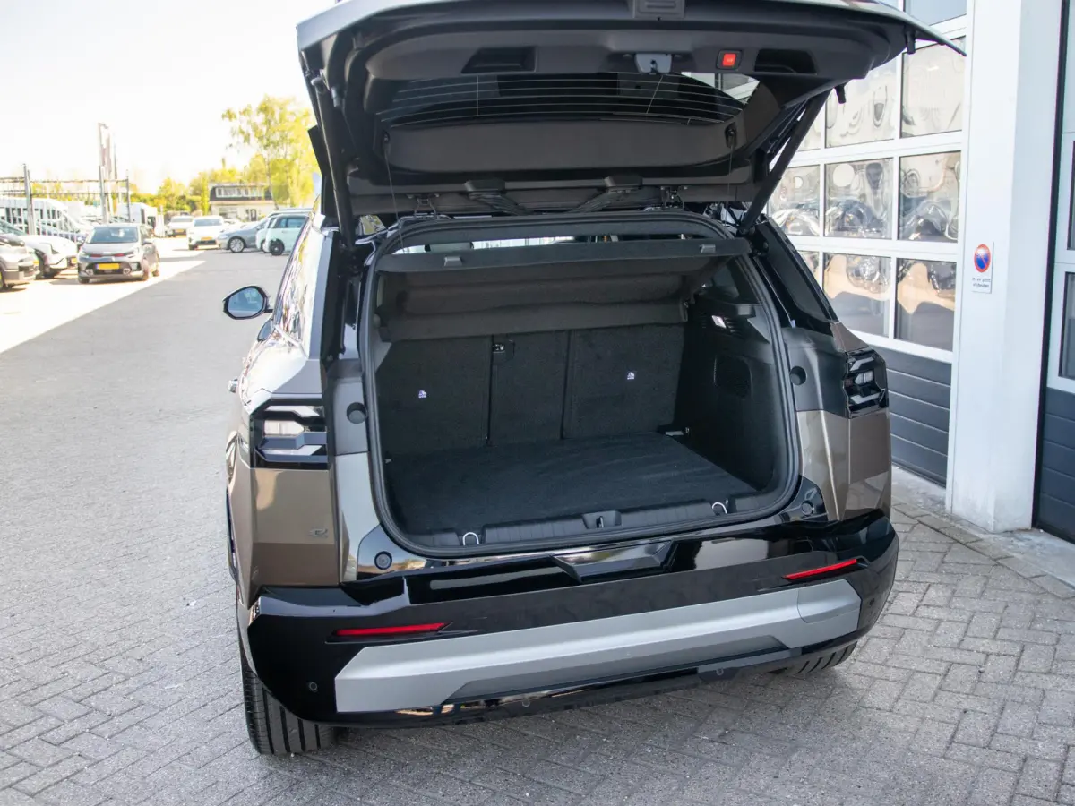 First Edition 74 kWh | Adapt. Cruise | Camera | Carplay | 20" | Elektr. A-Klep | Navi | Winter Pack | Schuif/Kanteldak | Premium Pack | Conv. Pack | Warmtepomp