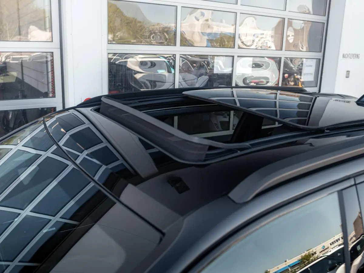 First Edition 74 kWh | Adapt. Cruise | Camera | Carplay | 20" | Elektr. A-Klep | Navi | Winter Pack | Schuif/Kanteldak | Premium Pack | Conv. Pack | Warmtepomp