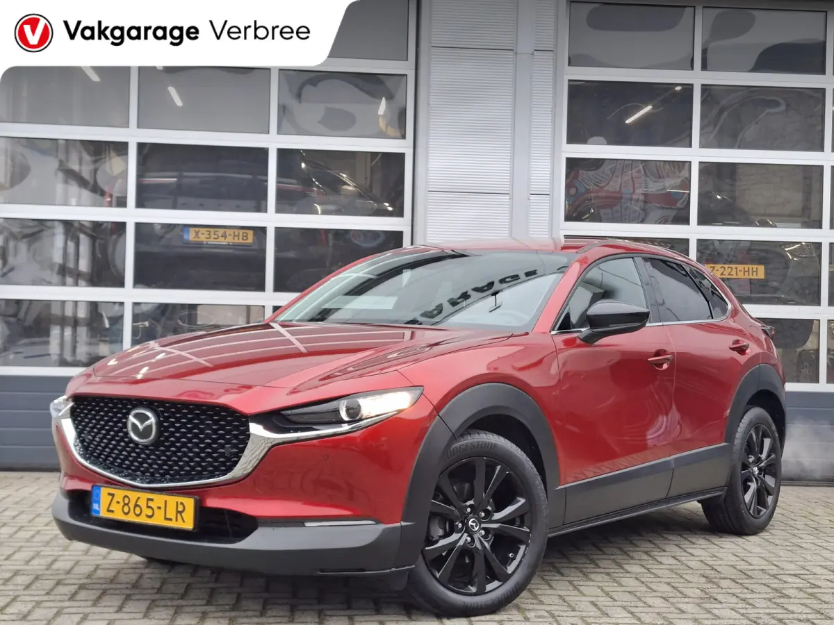 2.0 e-SkyActiv-G M Hybrid Homura | Navigatie/Android/Apple Carplay | Achteruitrij Camera | Voorstoelen Verwarmd | Head-up display | Voorstoelen verwarmd | Cruise Control Adaptief | LM Velgen
