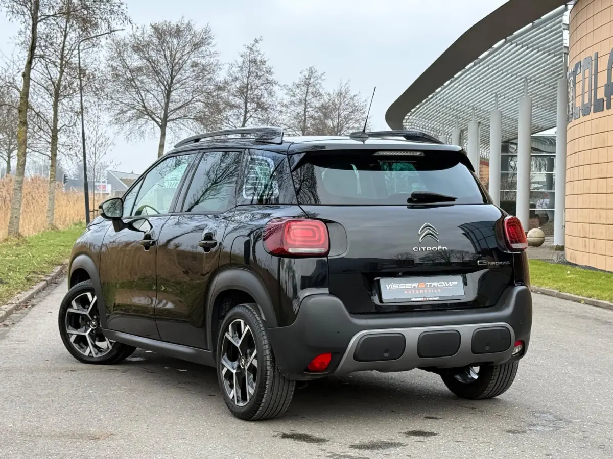 1.2 PureTech Shine 130pk Automaat - Noir Perla Nera - Panorama schuifdak/Carplay