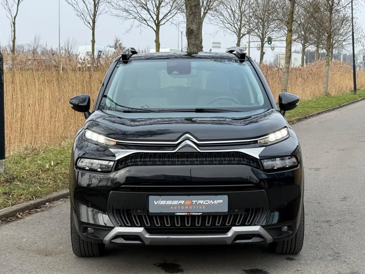 1.2 PureTech Shine 130pk Automaat - Noir Perla Nera - Panorama schuifdak/Carplay
