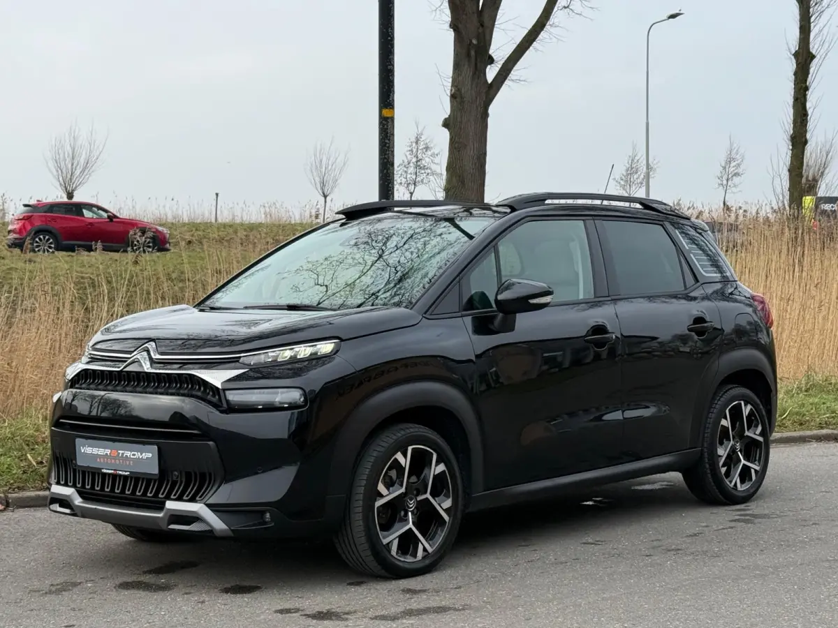 1.2 PureTech Shine 130pk Automaat - Noir Perla Nera - Panorama schuifdak/Carplay