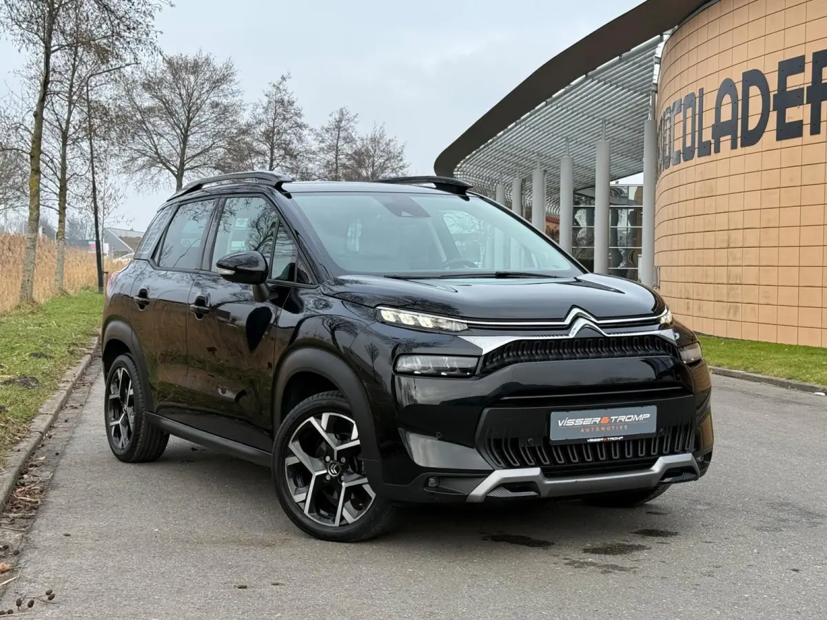 1.2 PureTech Shine 130pk Automaat - Noir Perla Nera - Panorama schuifdak/Carplay