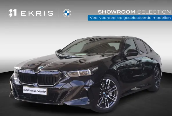 eDrive40 | Cruise Control Adaptief met Stop&Go | Glazen Panoramadak | Head-Up Display | Iconic Glow Grill | Harman/Kardon