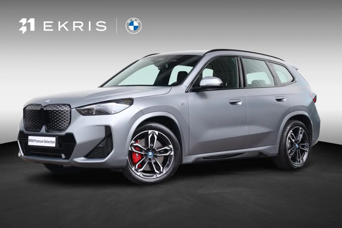 eDrive20 67 kWh M Sport Edition | SoH 100% | Sportpakket Pro | 19'' LM | Stoelverwarming Voor | Achteruitrijcamera |