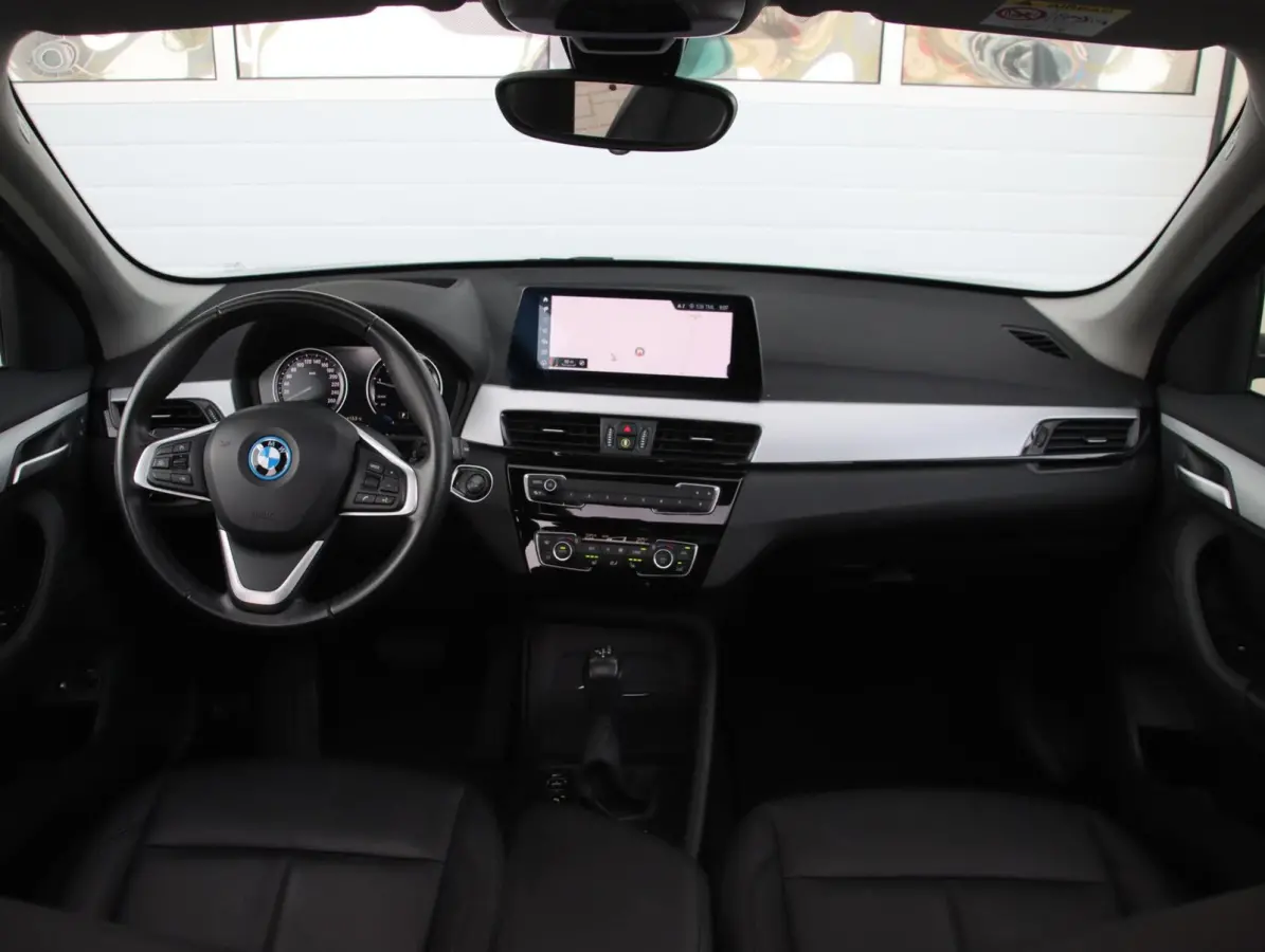xDrive25e High Executive | SOH 91% | Trekhaak | Panoramadak