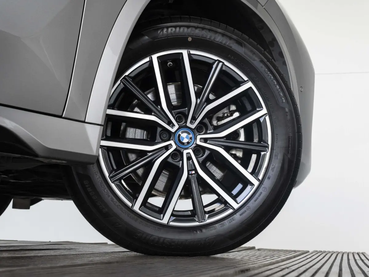 xDrive25e SoH 100% | M Sportpakket | Premium Pack | Comfort Access | Achteruitrijcamera | Stoelverwarming | 18''