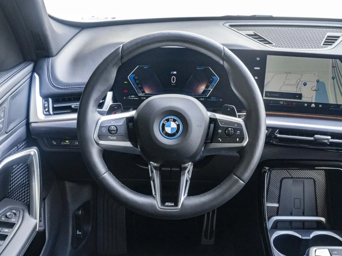 xDrive25e SoH 100% | M Sportpakket | Premium Pack | Comfort Access | Achteruitrijcamera | Stoelverwarming | 18''