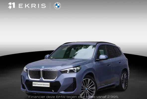 eDrive20 67 | M Sportpakket | Comfort Pack | 20 inch Multispaak | Trekhaak met elektrisch wegklapbare kogel | Glazen panoramadak | Harman-Kardon sound system