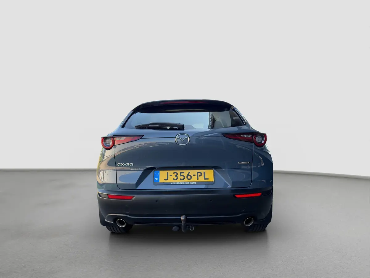 2.0 180pk SkyActiv-X M Hybrid Comfort | Trekhaak | Camera | Climate controle | Adaptive cruise controle | Dodehoek detectie | Elektrische achterklep | Keyless entry | Sensoren voor en achter