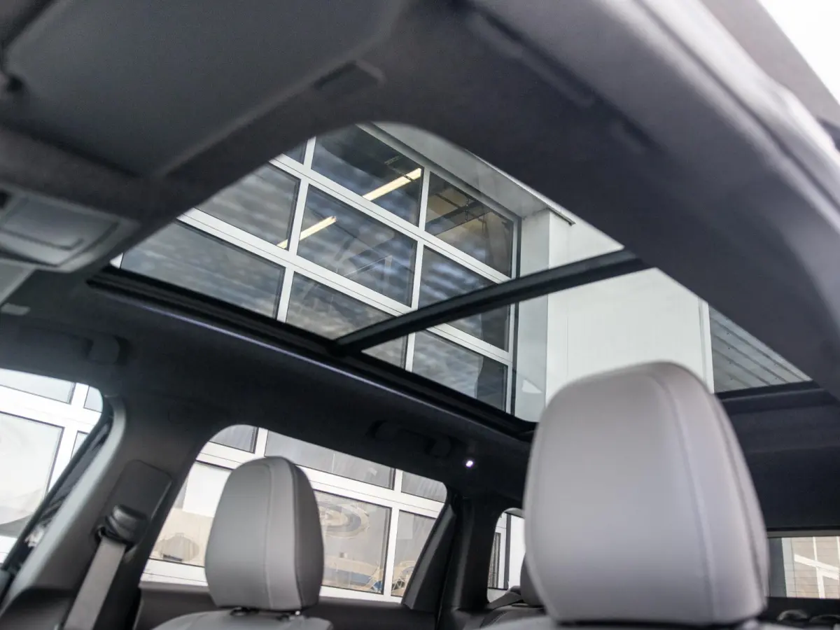 First Edition 74 kWh | Actieprijs | Adapt. Cruise | Camera | Carplay | 20" | Elektr. A-Klep | Navi | Winter Pack | Schuif/Kanteldak | Premium Pack | Conv. Pack | Warmtepomp