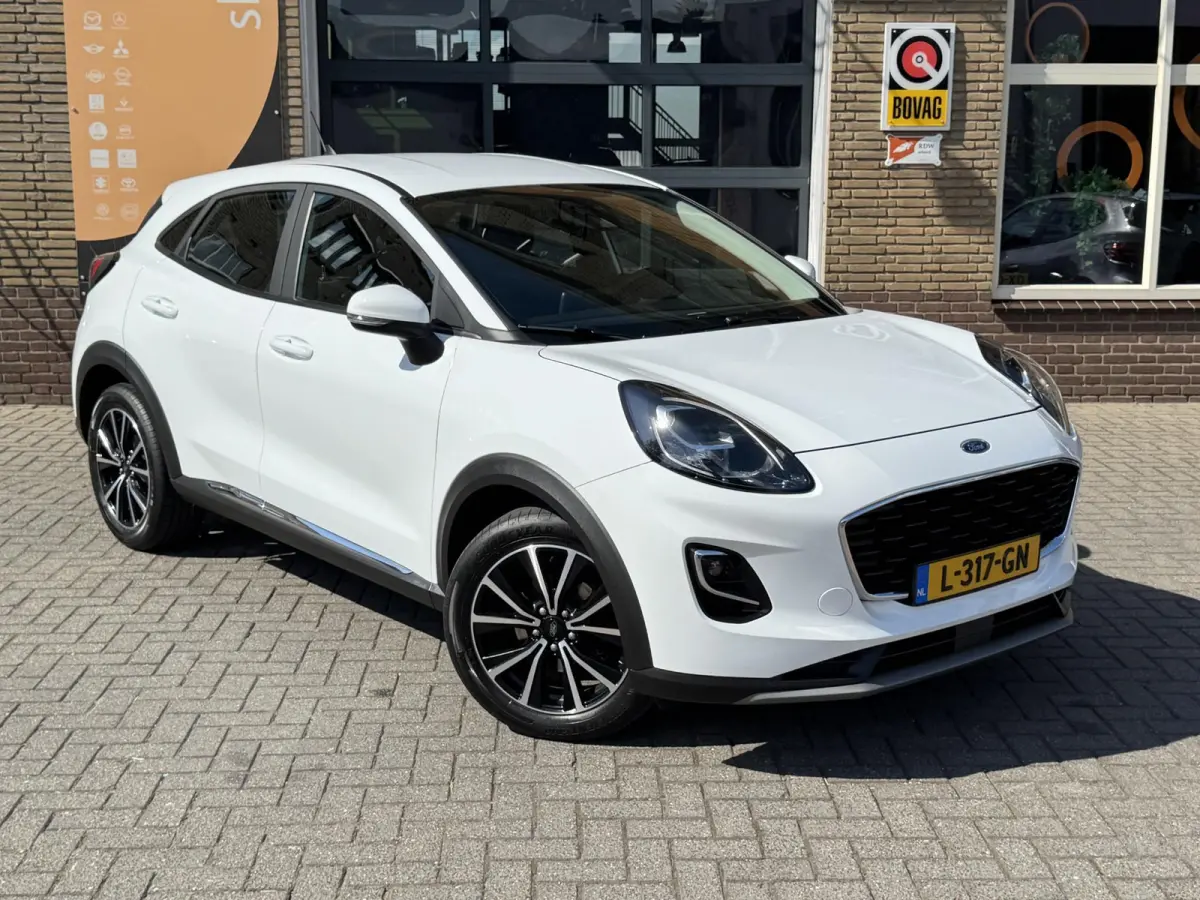 1.0 EcoBoost-Hybrid 125pk TITANIUM 1E EIG. CARPLAY/LED/WINTERPACK/NL-AUTO