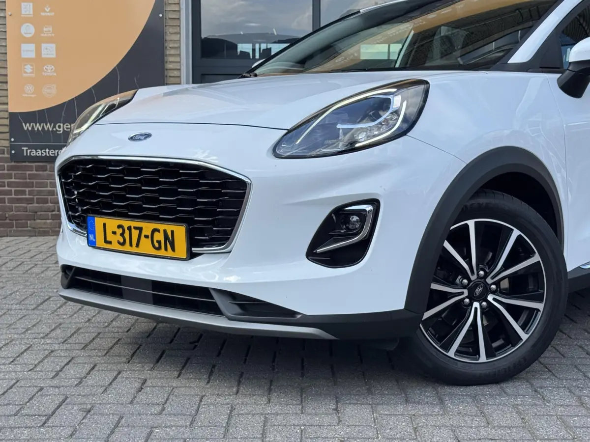 1.0 EcoBoost-Hybrid 125pk TITANIUM 1E EIG. CARPLAY/LED/WINTERPACK/NL-AUTO