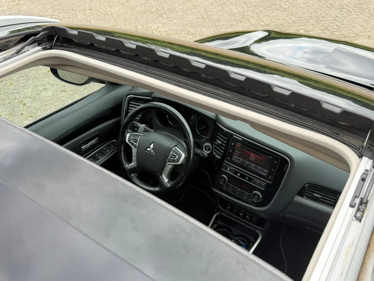 2.4 PHEV Intense Plus - Black Pearl - Schuif/kantel dak - Leder