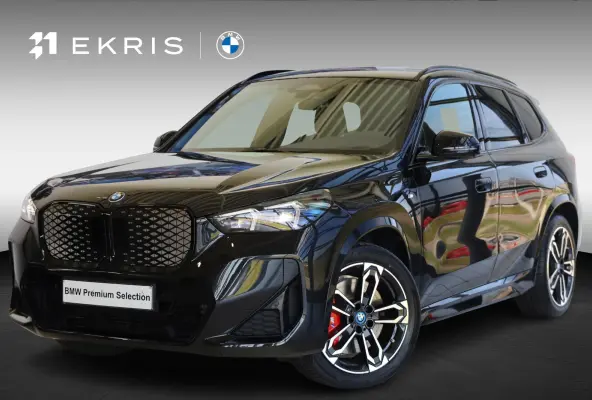 eDrive20 | M Sportpakket Pro | Driving Assistant Plus | Head-Up Display | Stoelverwarming