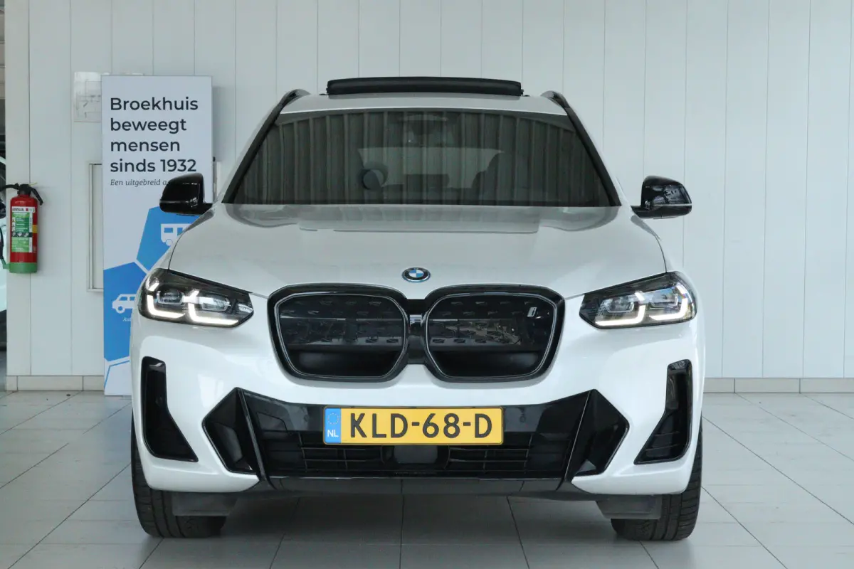 Executive 80 kWh M-Sport | SoH 99% | Adapt. Cruise | Schuifdak | Camera | Memory | Navi | Carplay | Elektr. klep