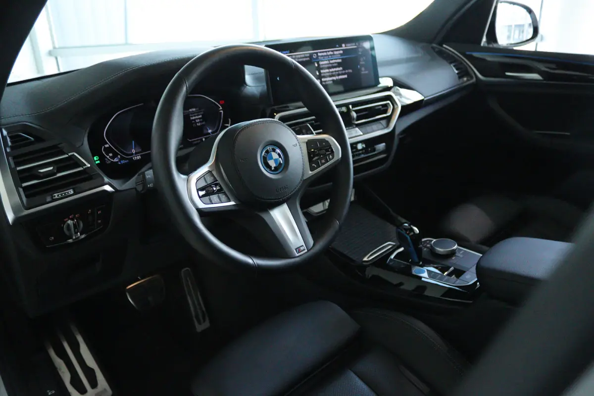 Executive 80 kWh M-Sport | SoH 99% | Adapt. Cruise | Schuifdak | Camera | Memory | Navi | Carplay | Elektr. klep