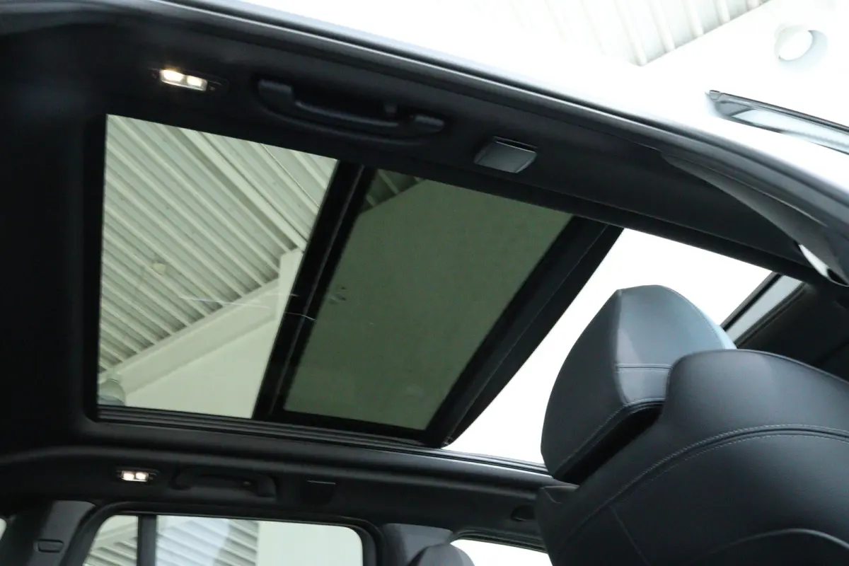 Executive 80 kWh M-Sport | SoH 99% | Adapt. Cruise | Schuifdak | Camera | Memory | Navi | Carplay | Elektr. klep