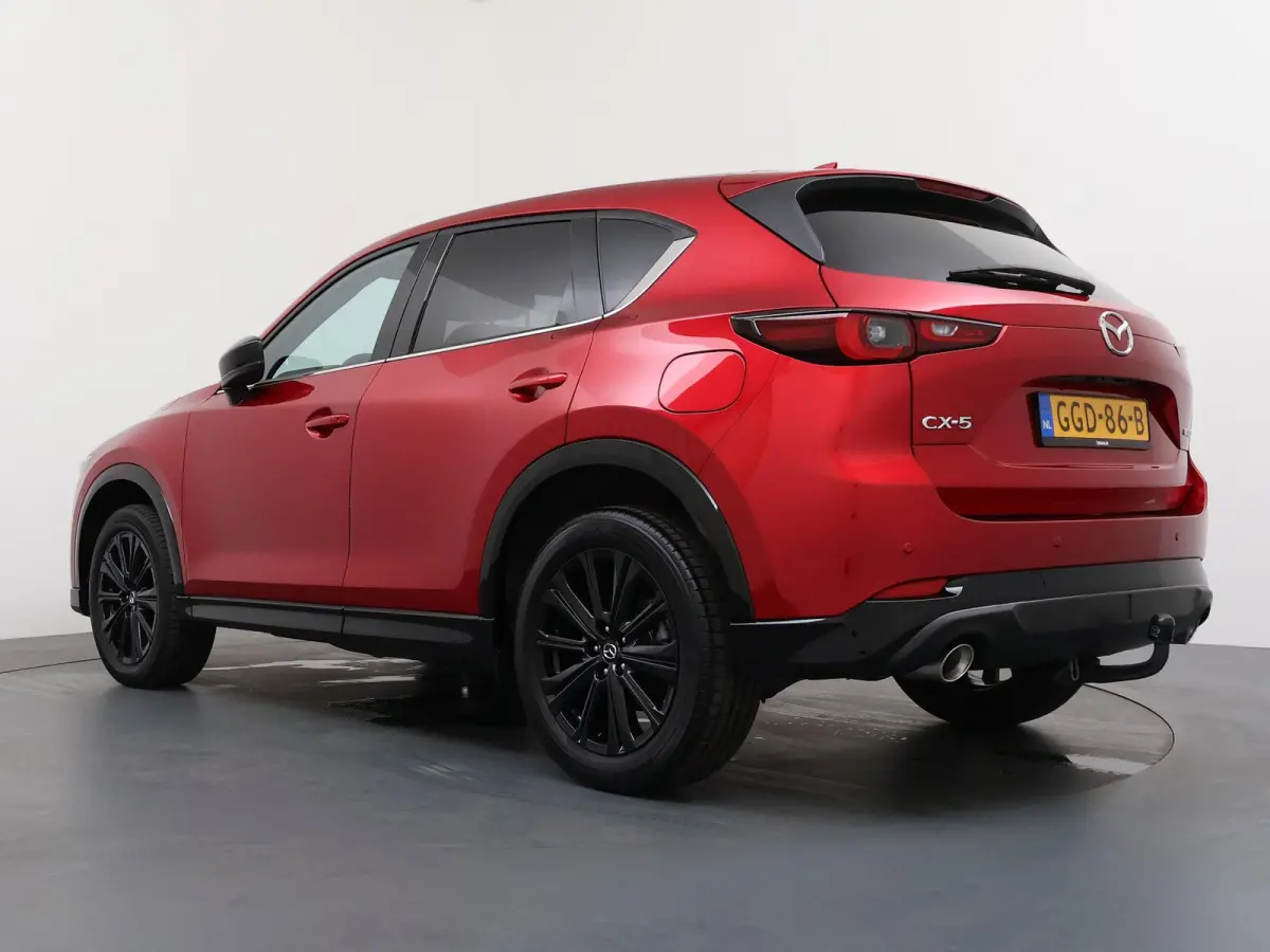 2.0 e-SkyActiv-G M Hybrid 165 Homura | Gevent. Leder | Verwarmde achterbank | Panoramadak | Trekhaak |