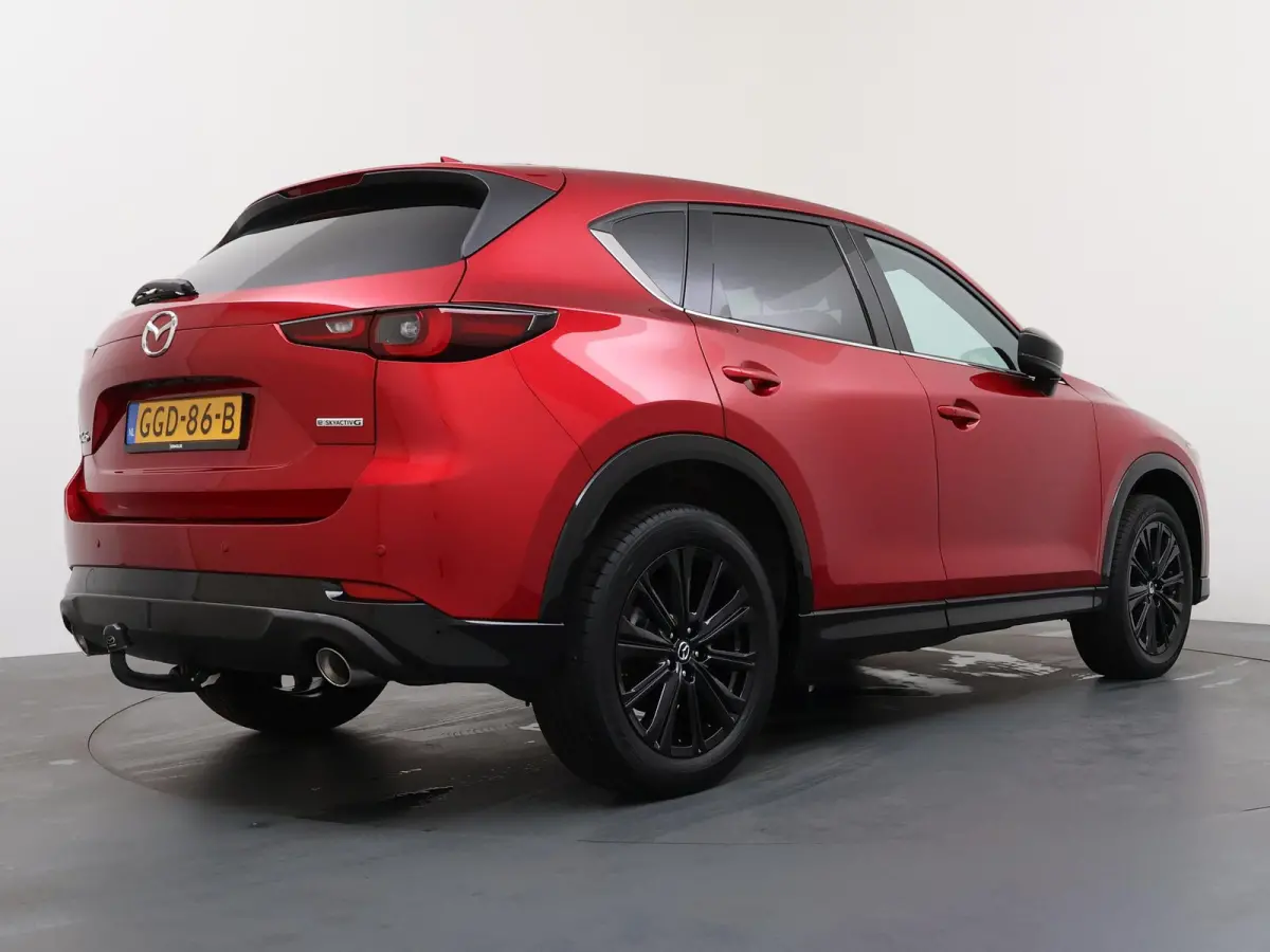 2.0 e-SkyActiv-G M Hybrid 165 Homura | Gevent. Leder | Verwarmde achterbank | Panoramadak | Trekhaak |