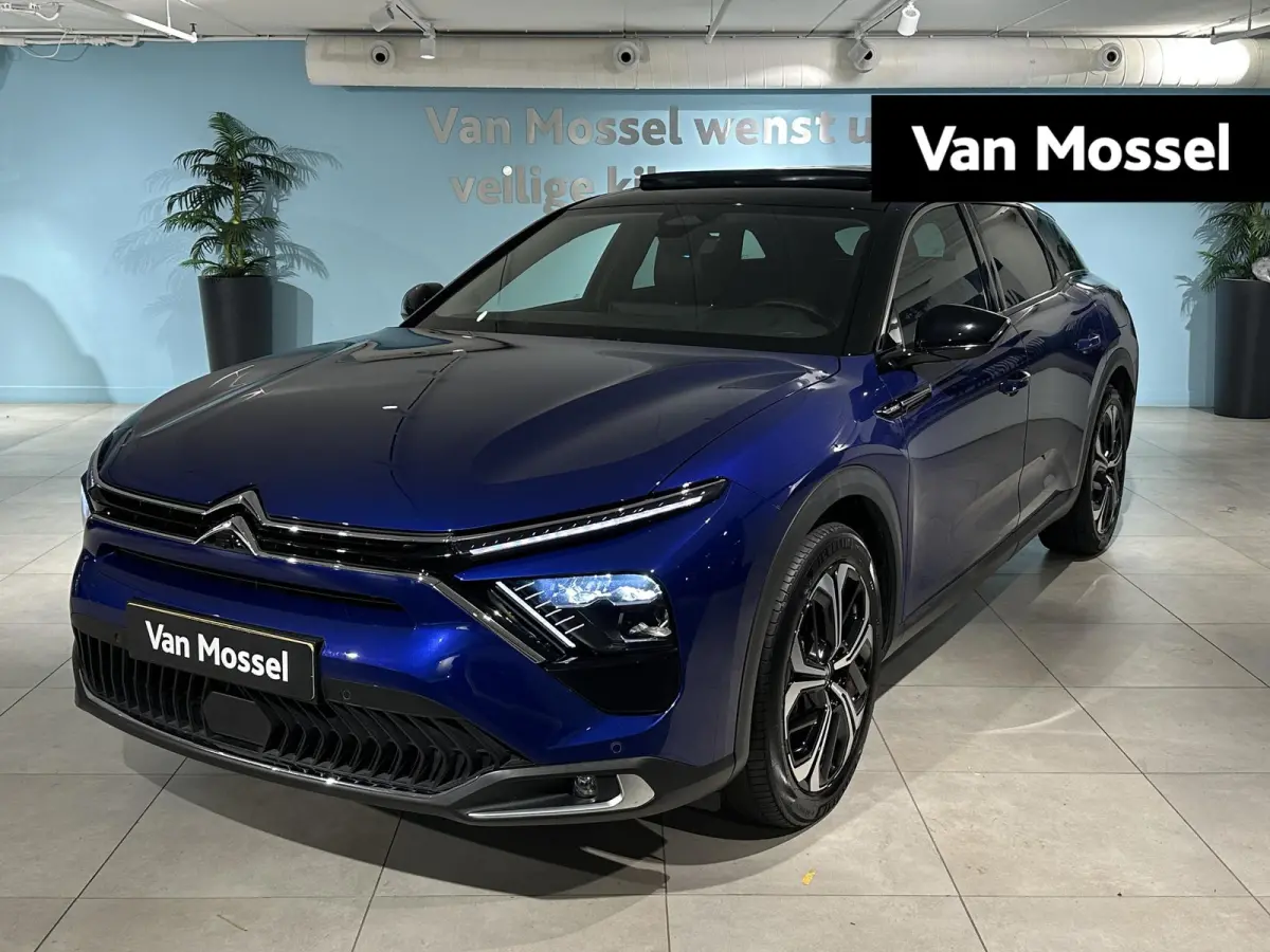 1.6 Plug-in Hybrid 225 Shine | Panoramisch schuif- kanteldak | Camera | Climate control | Navigatie