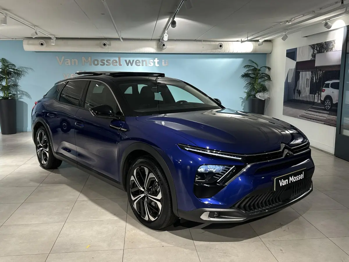 1.6 Plug-in Hybrid 225 Shine | Panoramisch schuif- kanteldak | Camera | Climate control | Navigatie