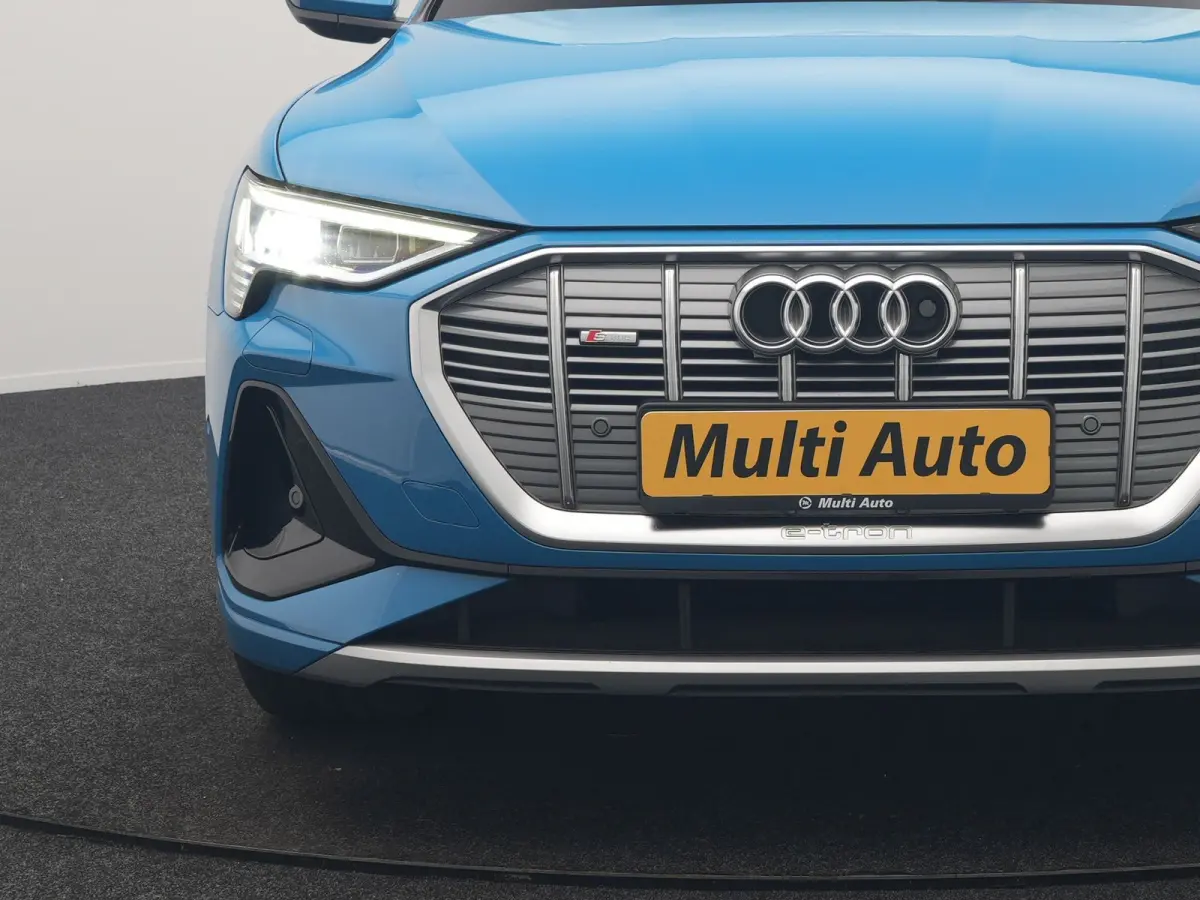 50 Quattro S Line 71 kWh 313pk Dealer O.H. | Luchtvering | Adaptive Cruise | Nachtzicht | Head Up | Camera | Alcantara Sportstoelen Verwarmd | Keyless | 20"L.M | Navigatie | DAB | Virtual Co