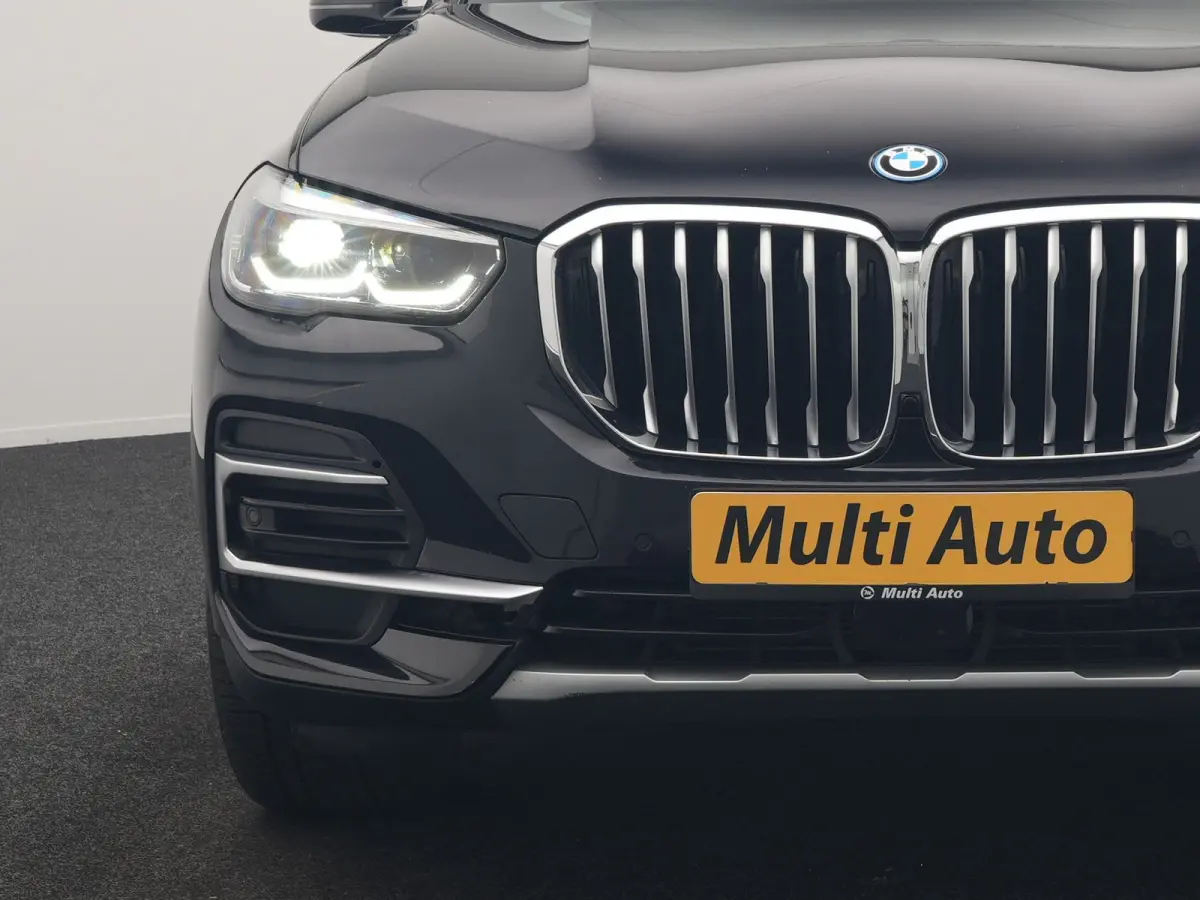 xDrive45e X Line PHEV 395pk Dealer O.H. | Luchtvering | Camera | Adaptief Onderstel | Lederen Sportstoelen Memory | Hifi Audio | Apple Carplay | Sfeerverlichting | Navigatie | DAB | Plug In 