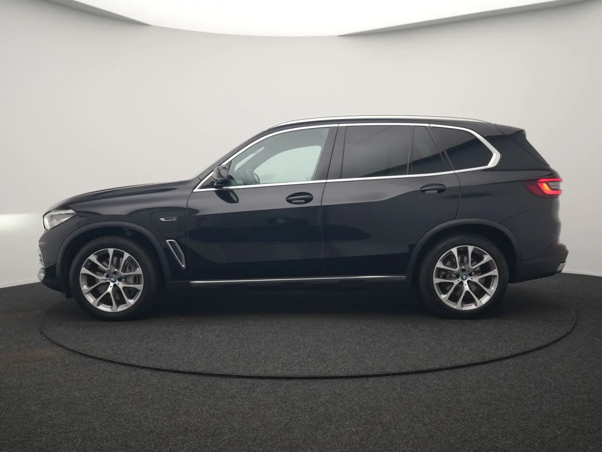 xDrive45e X Line PHEV 395pk Dealer O.H. | Luchtvering | Camera | Adaptief Onderstel | Lederen Sportstoelen Memory | Hifi Audio | Apple Carplay | Sfeerverlichting | Navigatie | DAB | Plug In 