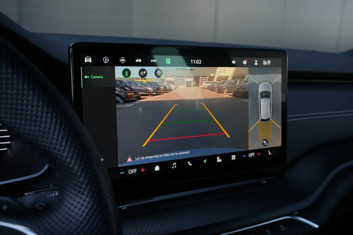 1.5 TSI MHEV Sportline Business | Panoramadak | Trekhaak | HUD | Stoelverwarming | Carplay | Camera