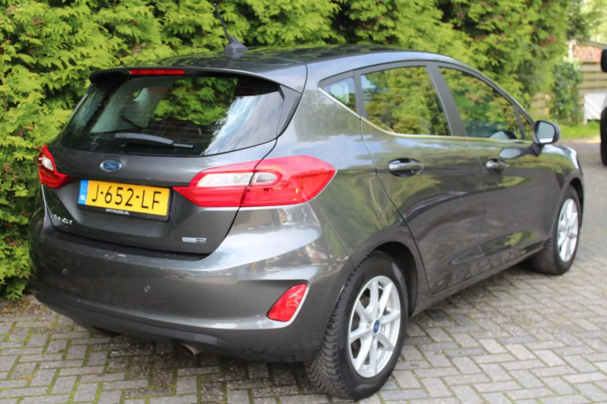 1.0 EcoBoost Hybrid Titanium 125PK | Climate Control | NAVI | LMV | PDC V+A | Cruise Control | Dealeronderhouden