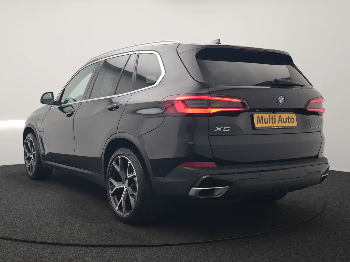 xDrive45e High Executive PHEV 395pk Dealer O.H. | Panodak | Luchtvering | 360 Camera | Adaptief Onderstel | Lederen Sportstoelen Memory & Verwarmd | Sfeerverlichting | Apple Carplay | Naviga