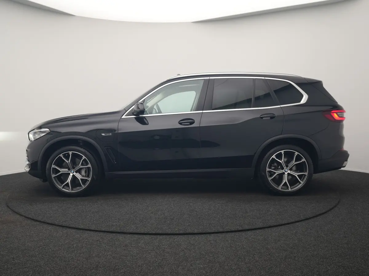 xDrive45e High Executive PHEV 395pk Dealer O.H. | Panodak | Luchtvering | 360 Camera | Adaptief Onderstel | Lederen Sportstoelen Memory & Verwarmd | Sfeerverlichting | Apple Carplay | Naviga