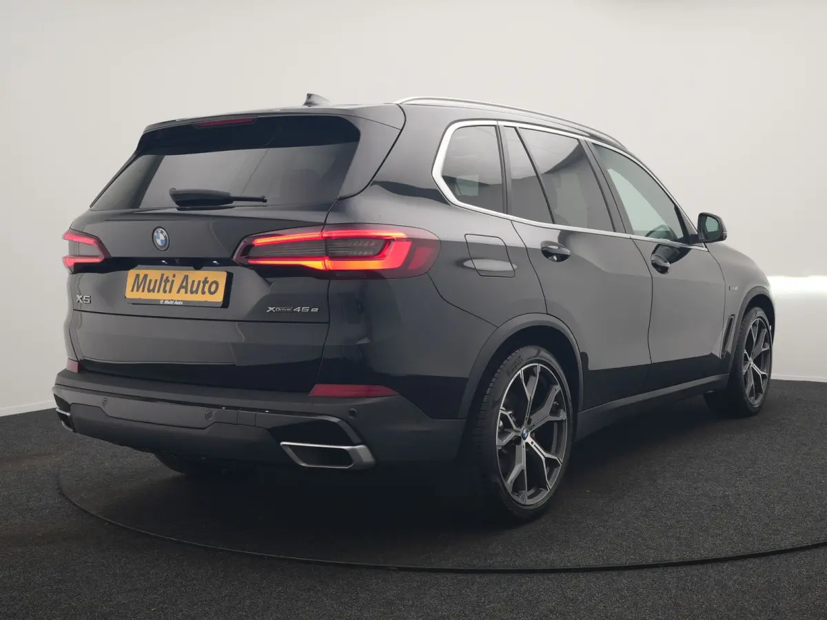 xDrive45e High Executive PHEV 395pk Dealer O.H. | Panodak | Luchtvering | 360 Camera | Adaptief Onderstel | Lederen Sportstoelen Memory & Verwarmd | Sfeerverlichting | Apple Carplay | Naviga