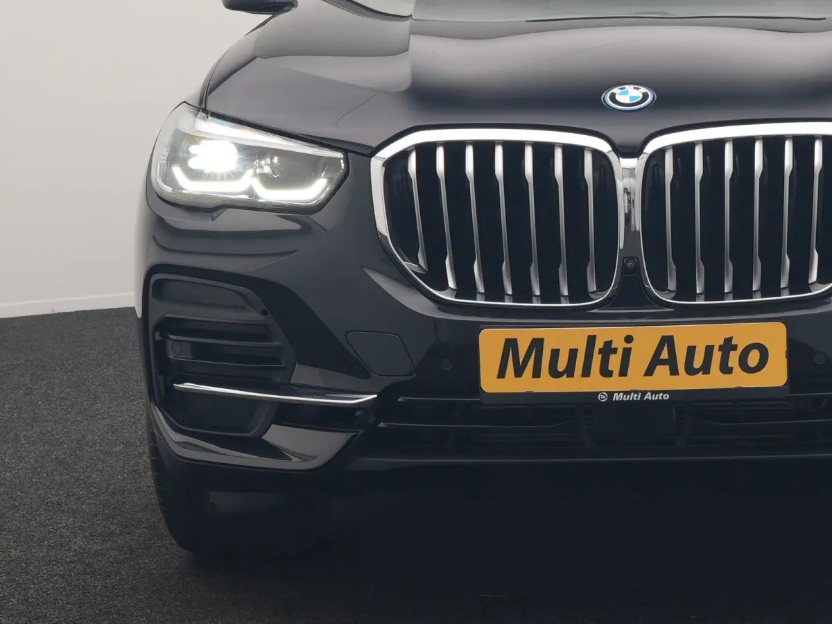 xDrive45e High Executive PHEV 395pk Dealer O.H. | Panodak | Luchtvering | 360 Camera | Adaptief Onderstel | Lederen Sportstoelen Memory & Verwarmd | Sfeerverlichting | Apple Carplay | Naviga