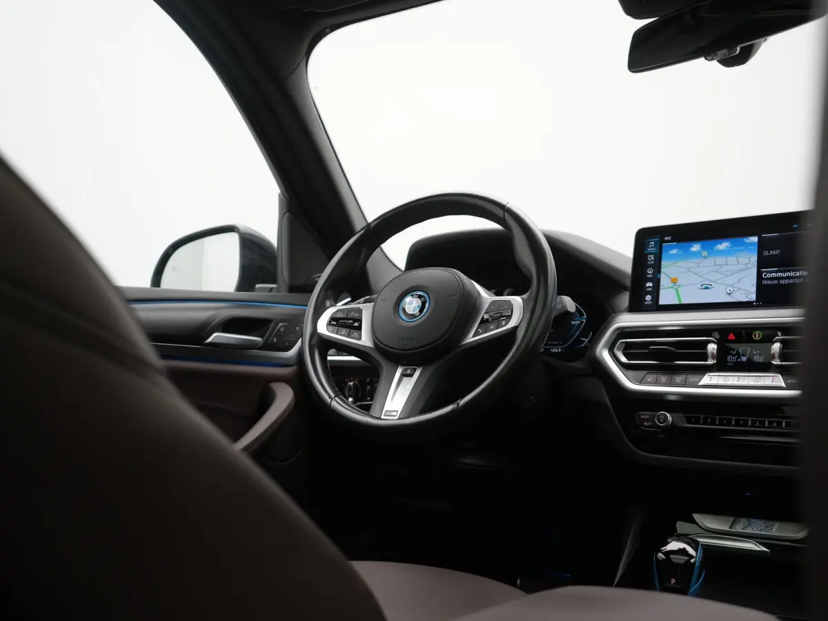 M Sport High Executive 80 kWh 286pk Dealer O.H | Trekhaak Af Fabriek | Panodak | Laser LED | Head Up | Adaptive Cruise | 360 Camera | Lederen Sportstoelen Memory & Verwarmd | Harman / Kardon