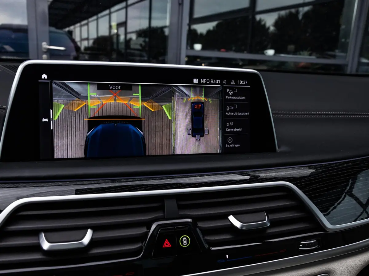 750i xDrive High Executive | M-SPORT | TANSANITBLAU | INTEGRAL ACTIVE STEERING | STOELMASSAGE | STOELVENTILATIE | SCHUIF-KANTELDAK | TREKHAAK | HEAD-UP | SOFTCLOSE | DRIVING ASSIST.PROF | HA
