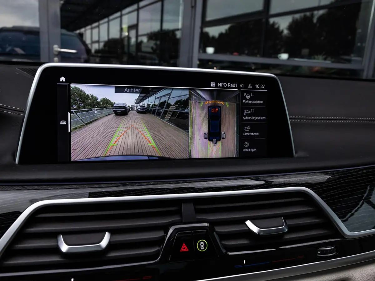 750i xDrive High Executive | M-SPORT | TANSANITBLAU | INTEGRAL ACTIVE STEERING | STOELMASSAGE | STOELVENTILATIE | SCHUIF-KANTELDAK | TREKHAAK | HEAD-UP | SOFTCLOSE | DRIVING ASSIST.PROF | HA