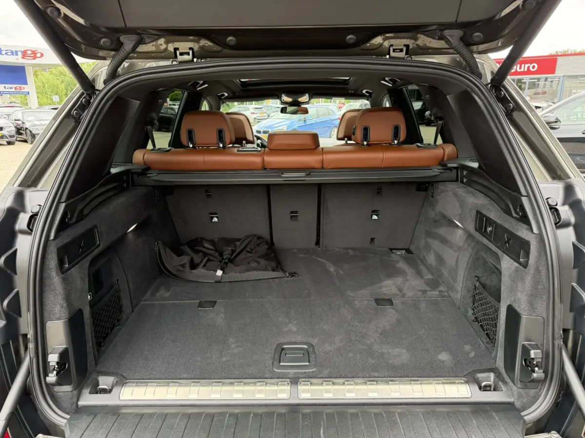 xDrive50e M Sport Panoramadak Trekhaak Carplay 21 Inch Harman-Kardon Comfortzetels Head-Up Display Softclose