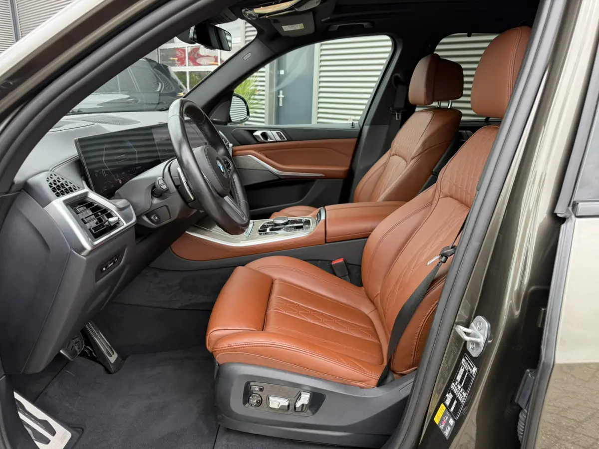xDrive50e M Sport Panoramadak Trekhaak Carplay 21 Inch Harman-Kardon Comfortzetels Head-Up Display Softclose