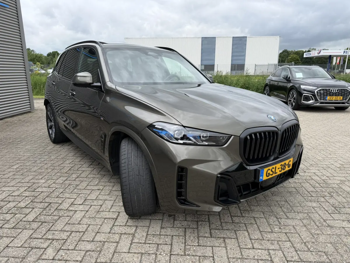 xDrive50e M Sport Panoramadak Trekhaak Carplay 21 Inch Harman-Kardon Comfortzetels Head-Up Display Softclose