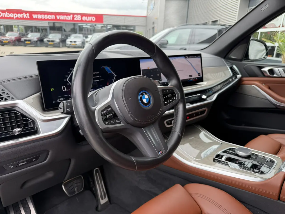 xDrive50e M Sport Panoramadak Trekhaak Carplay 21 Inch Harman-Kardon Comfortzetels Head-Up Display Softclose