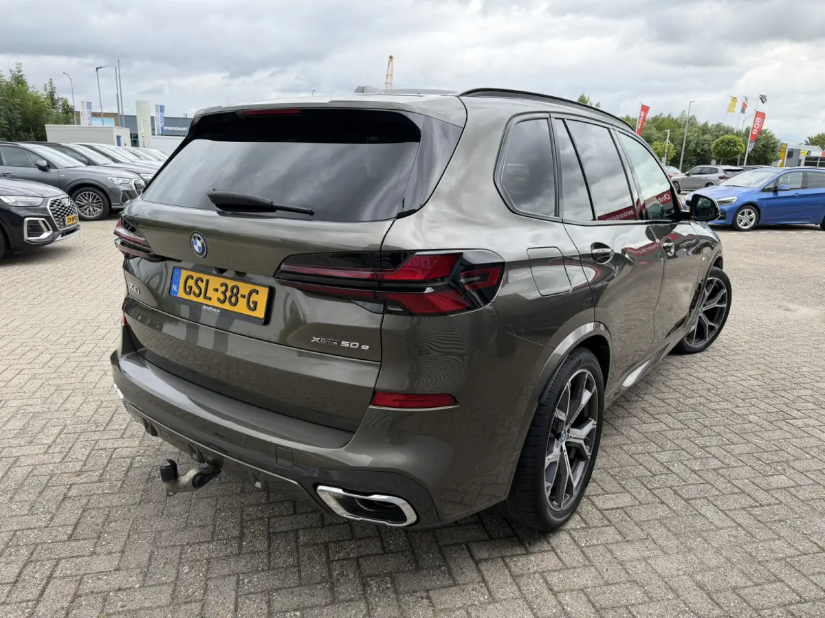 xDrive50e M Sport Panoramadak Trekhaak Carplay 21 Inch Harman-Kardon Comfortzetels Head-Up Display Softclose