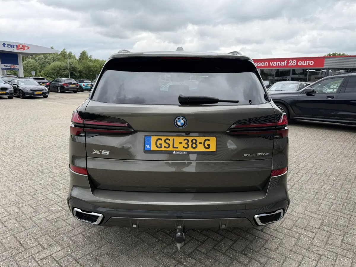 xDrive50e M Sport Panoramadak Trekhaak Carplay 21 Inch Harman-Kardon Comfortzetels Head-Up Display Softclose