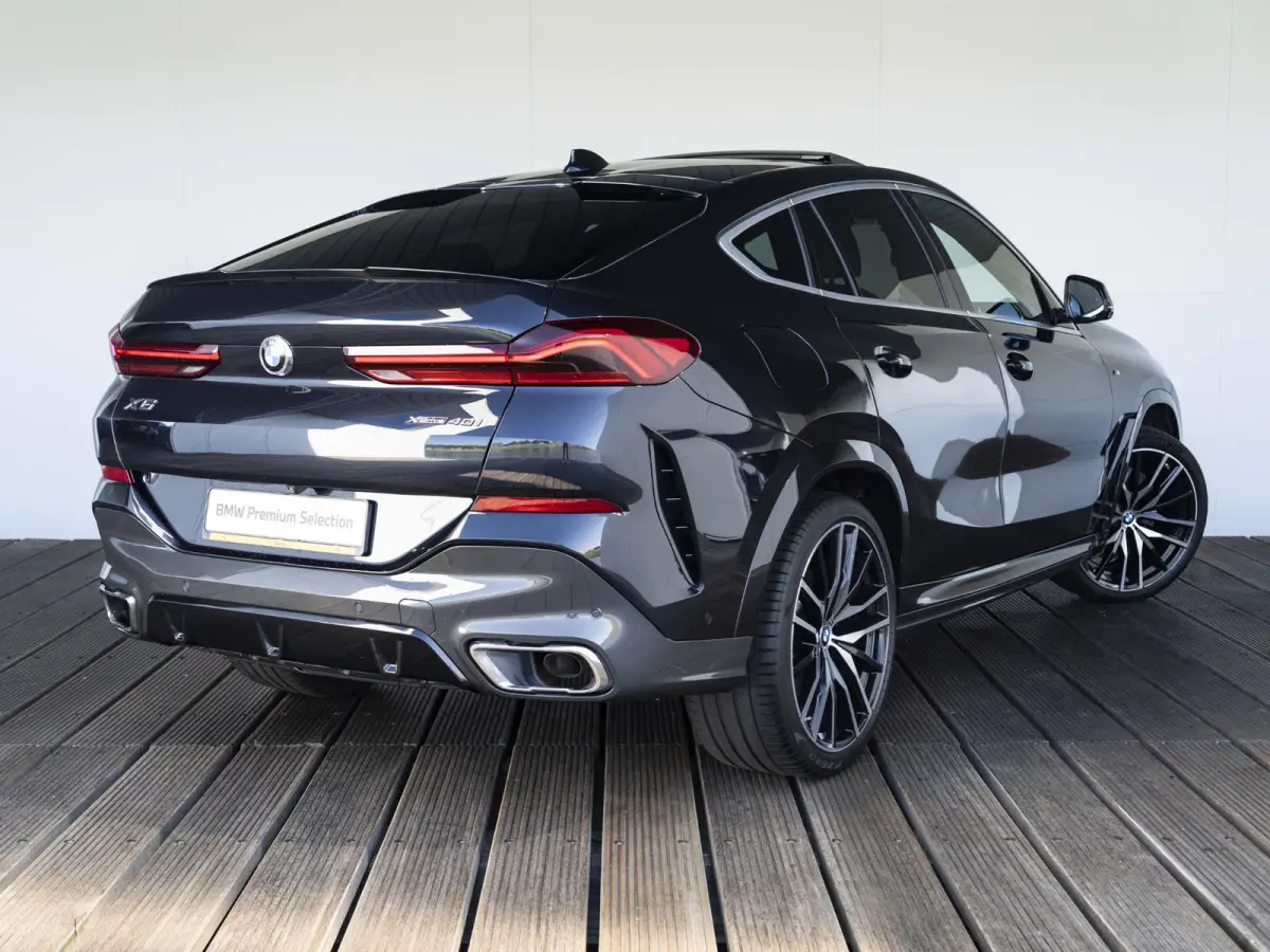 xDrive40i | M Sportpakket | High Executive | 22 inch | M Adaptief onderstel | Iconic Glow nierengrille | Comfortstoelen | Driving Assistant Professional | BMW Laserlight | Head-Up Display | 