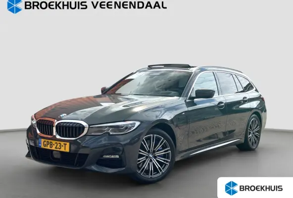 Touring 330e 292pk M-Sport | Pano | Trekhaak | Adap. Cruise | HUD | Stoelverwarming | BLIS |